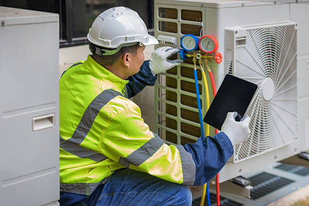 Professional Hvac technician working in Highland, CA